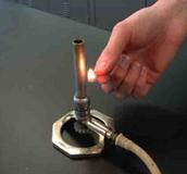 Bunsen Burner Being Safely Lit With a Match